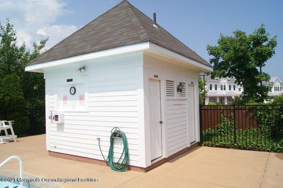 50 Wyckham Road Spring Lake Heights, NJ 07762 - Photo 24 of 27 a front view of a house with a balcony