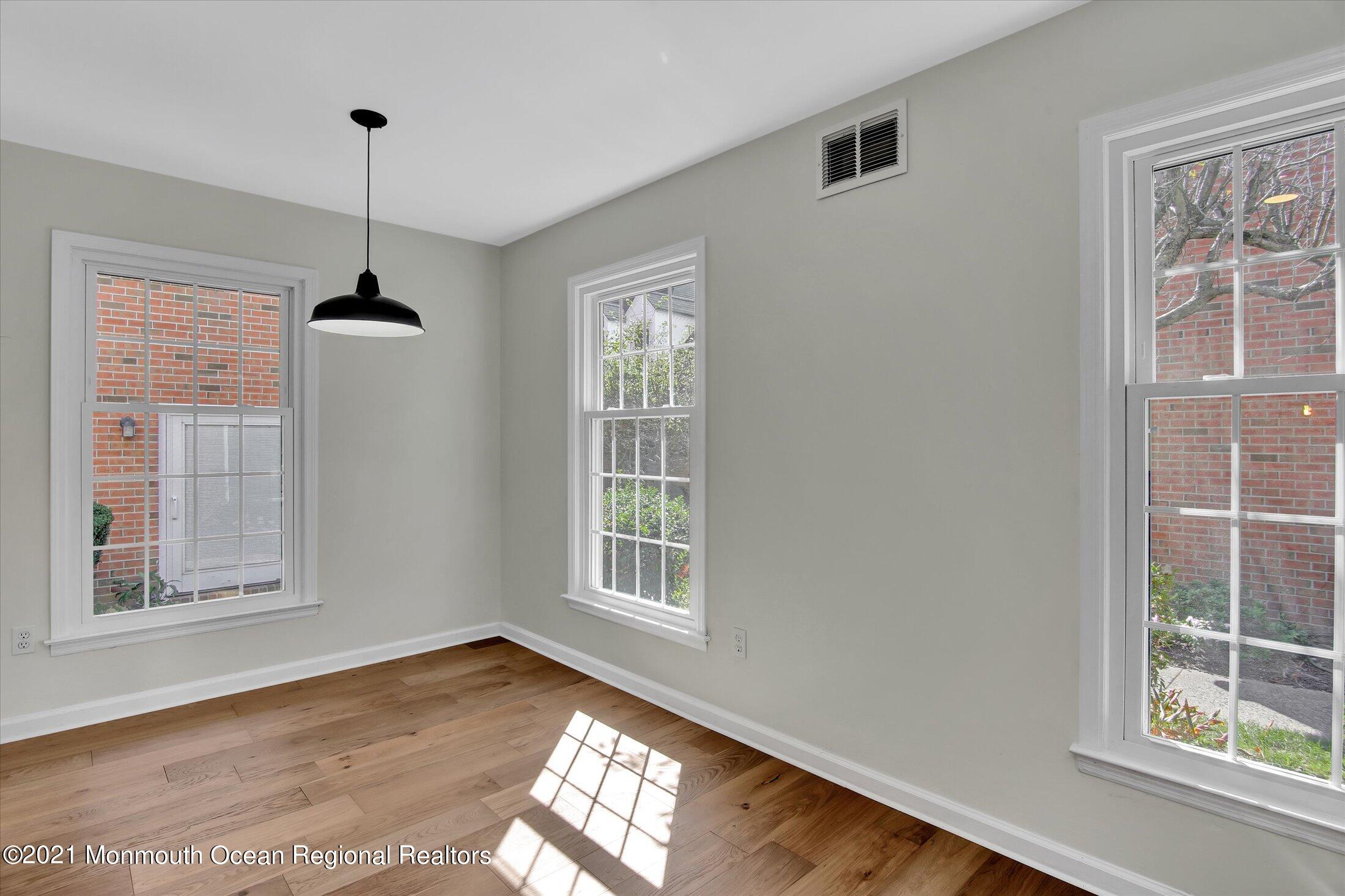 50 Wyckham Road Spring Lake Heights, NJ 07762 - Photo 5 of 27 a view of an empty room with a window