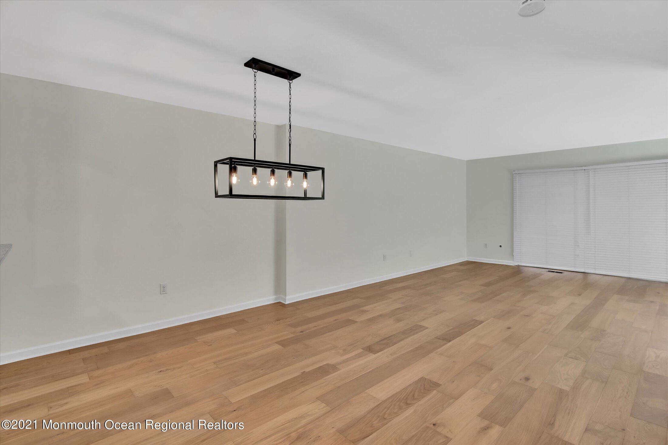 50 Wyckham Road Spring Lake Heights, NJ 07762 - Photo 6 of 27 a view of an empty room with a window