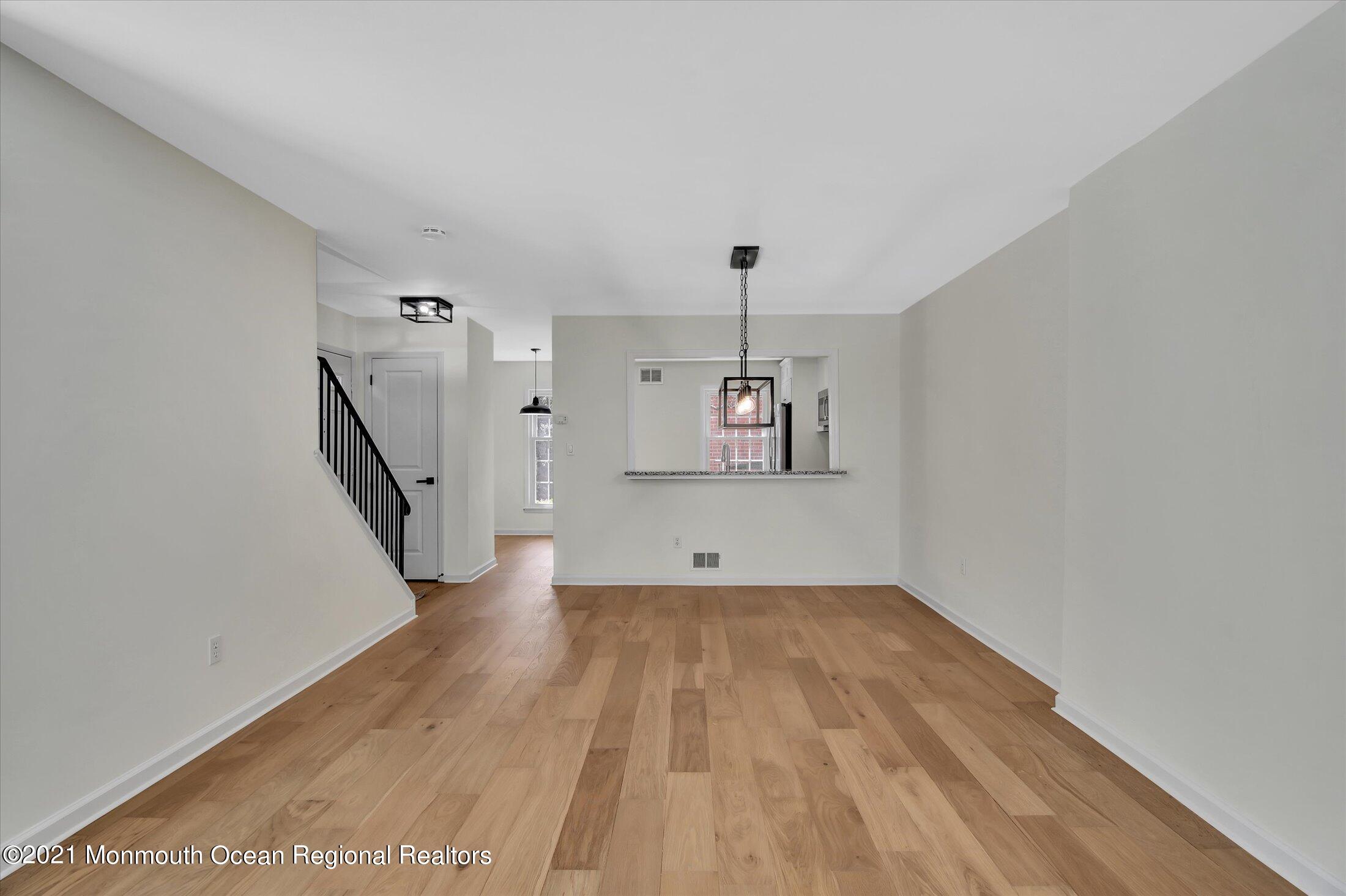 50 Wyckham Road Spring Lake Heights, NJ 07762 - Photo 25 of 27 a view of empty room with wooden floor