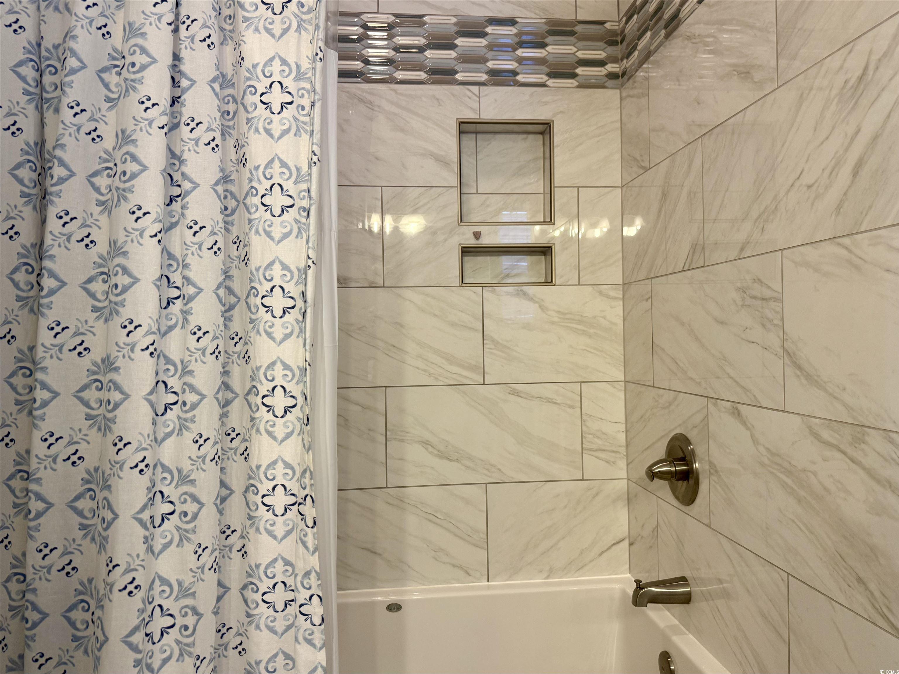 118 Georges Bay Road Murrells Inlet, SC 29576 - Photo 12 of 39 Full bathroom featuring shower / tub combo with curtain