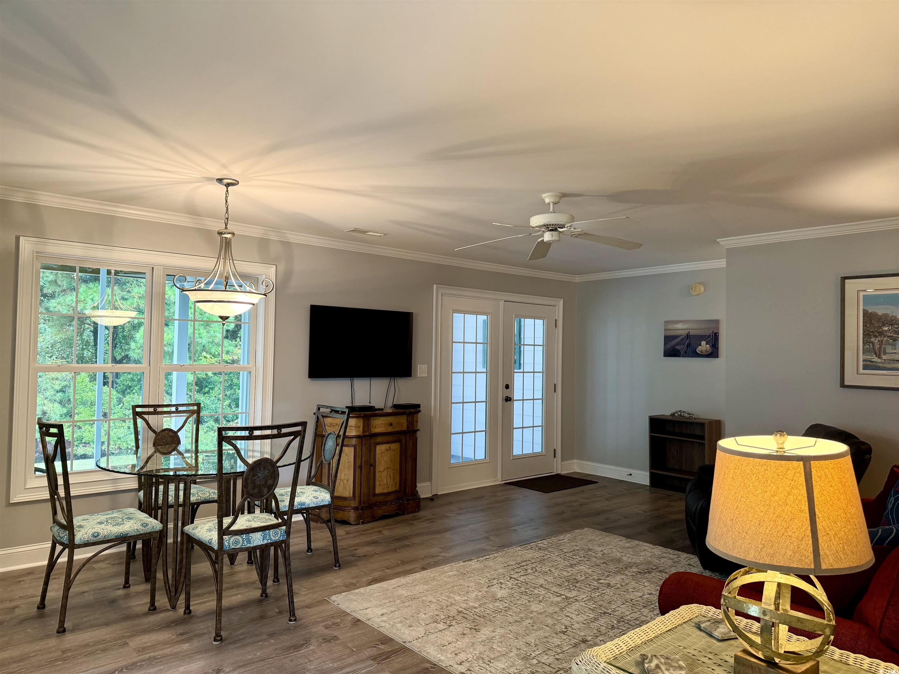 118 Georges Bay Road Murrells Inlet, SC 29576 - Photo 21 of 39 Dining space featuring ornamental molding, wood finished floors, and ceiling fan