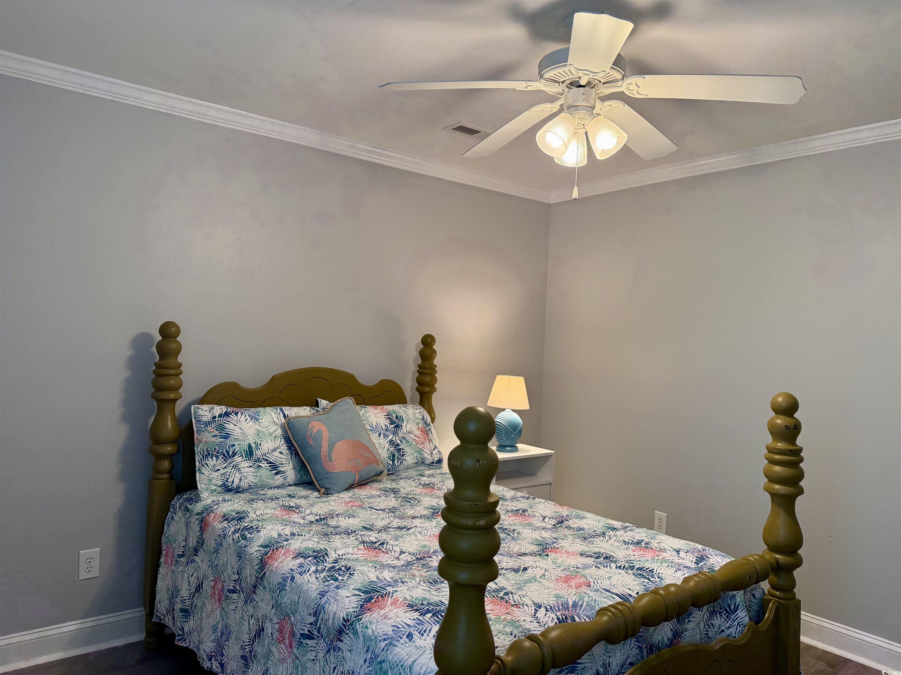 118 Georges Bay Road Murrells Inlet, SC 29576 - Photo 27 of 39 Bedroom featuring ornamental molding and a ceiling fan