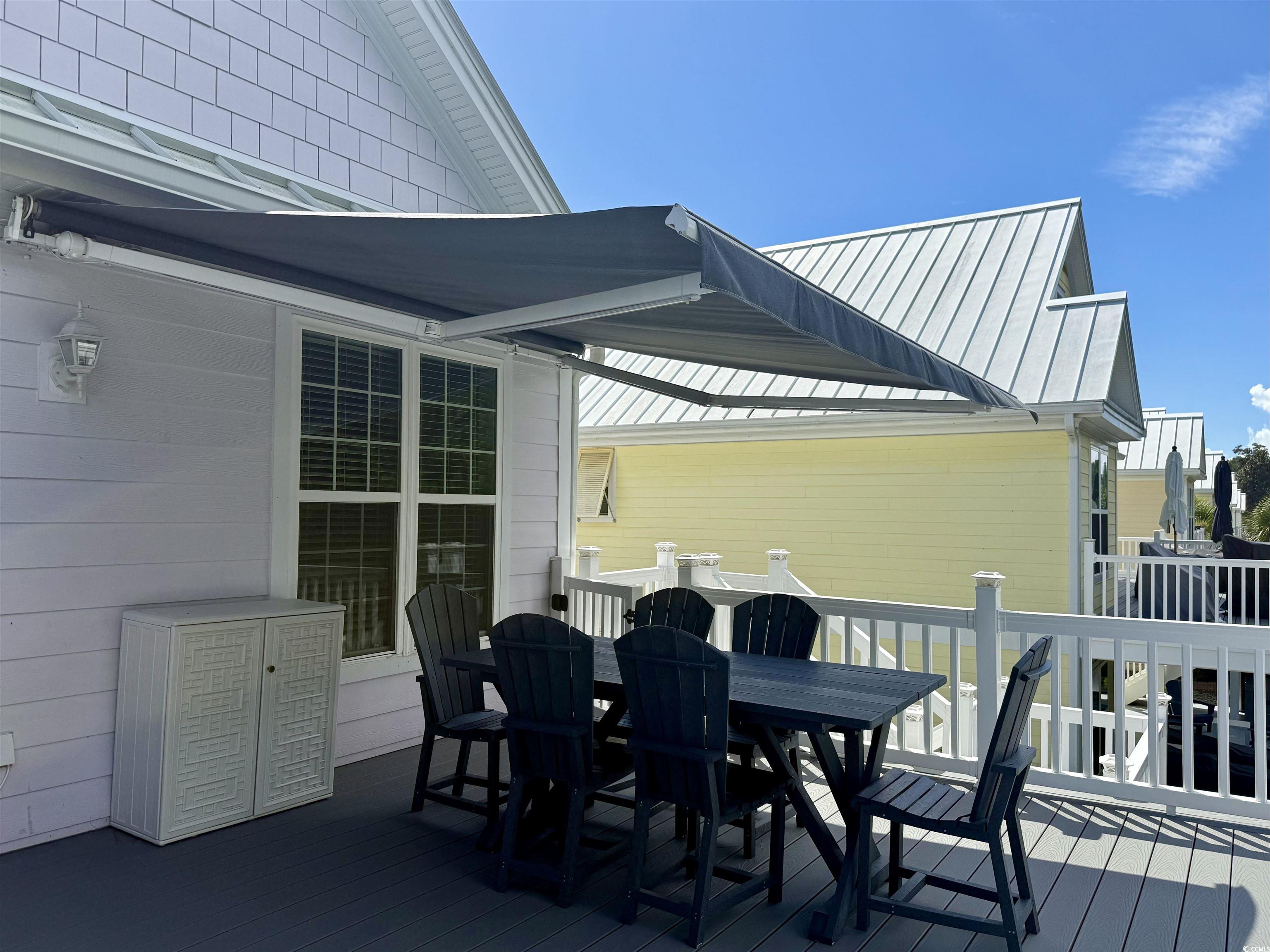 118 Georges Bay Road Murrells Inlet, SC 29576 - Photo 34 of 39 Wooden terrace with outdoor dining area