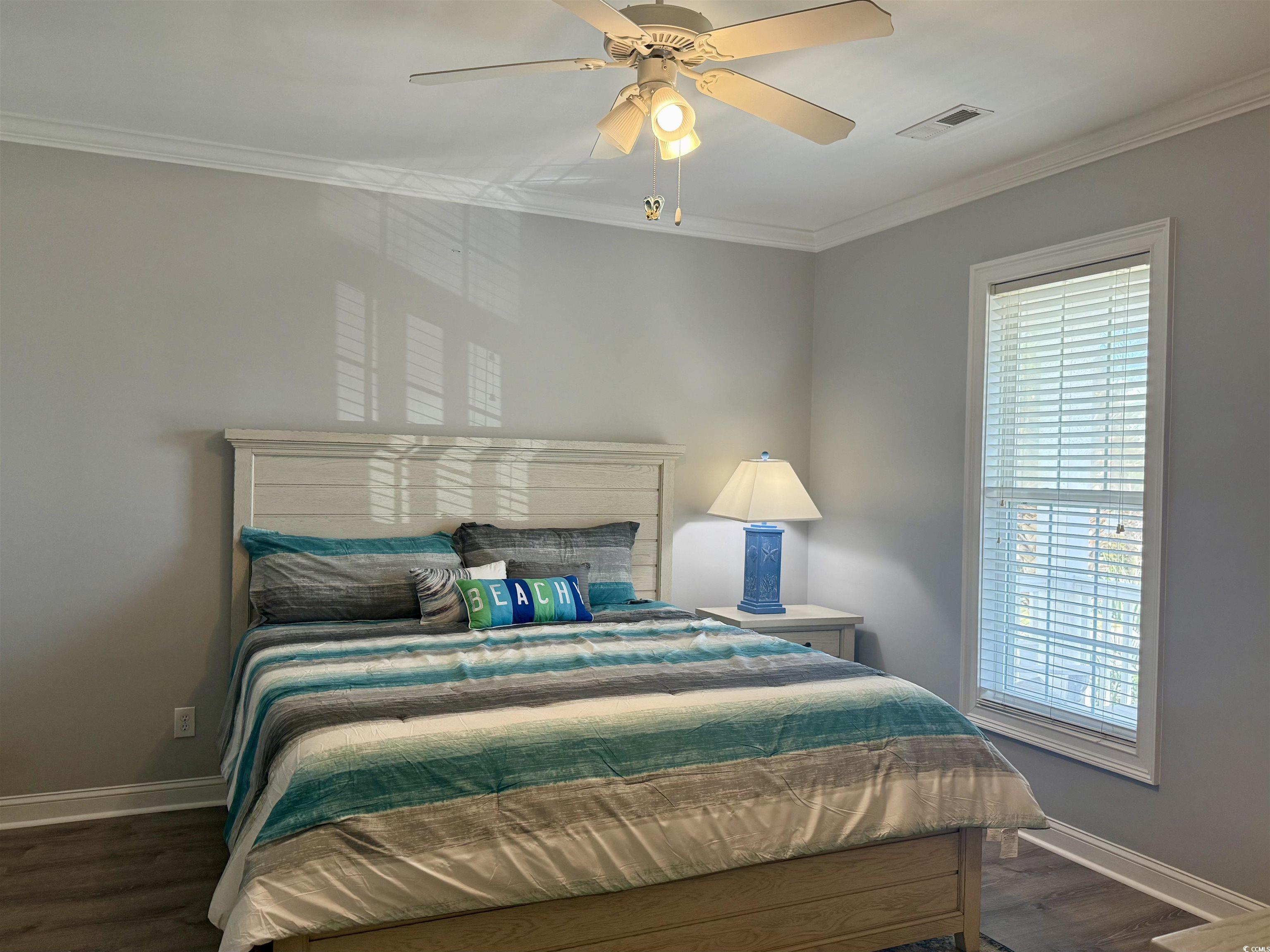 118 Georges Bay Road Murrells Inlet, SC 29576 - Photo 10 of 39 Bedroom featuring crown molding, dark wood-type flooring, and ceiling fan