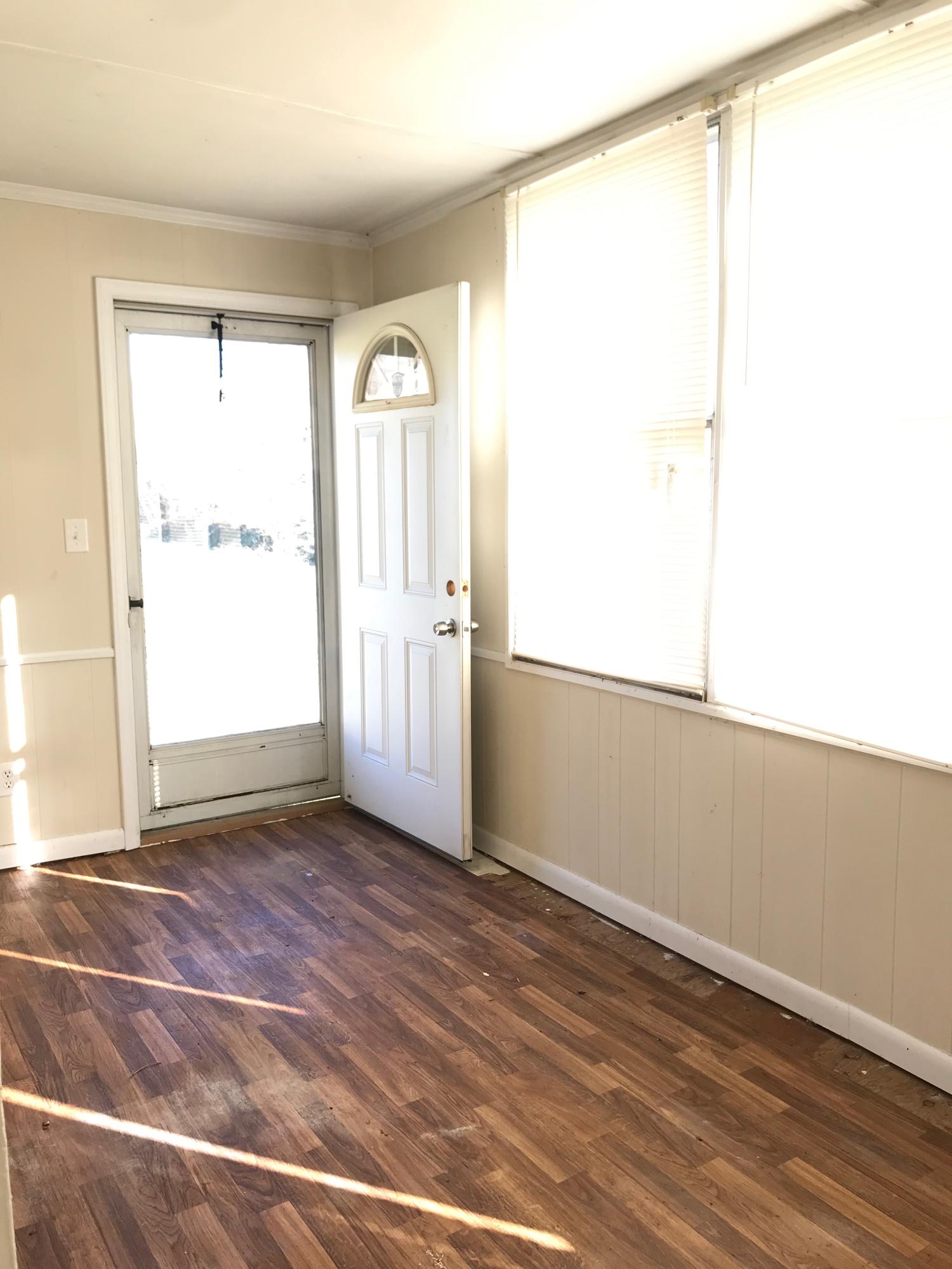 2553 Webster Road Roanoke, VA 24012 - Photo 13 of 29 a view of empty room with wooden floor and fan