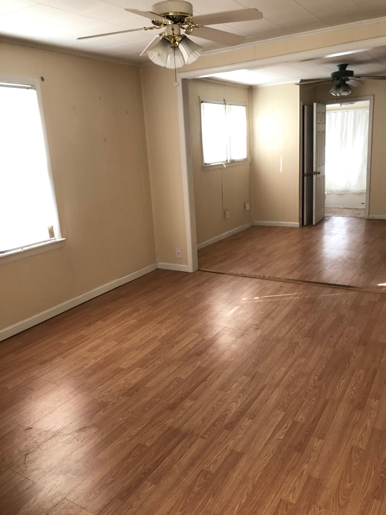 2553 Webster Road Roanoke, VA 24012 - Photo 14 of 29 an empty room with wooden floor and windows