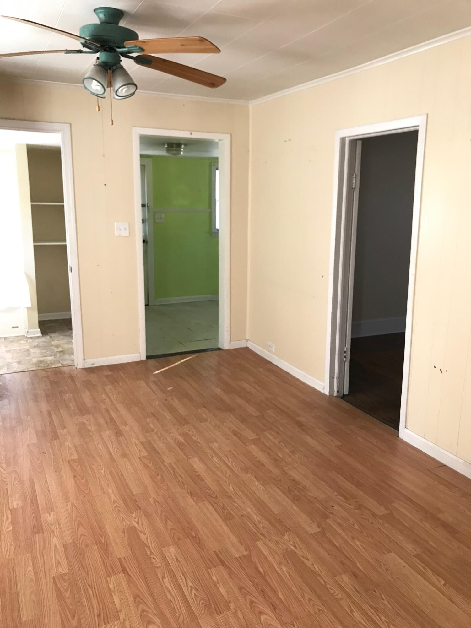 2553 Webster Road Roanoke, VA 24012 - Photo 21 of 29 an empty room with closet and a chandelier fan