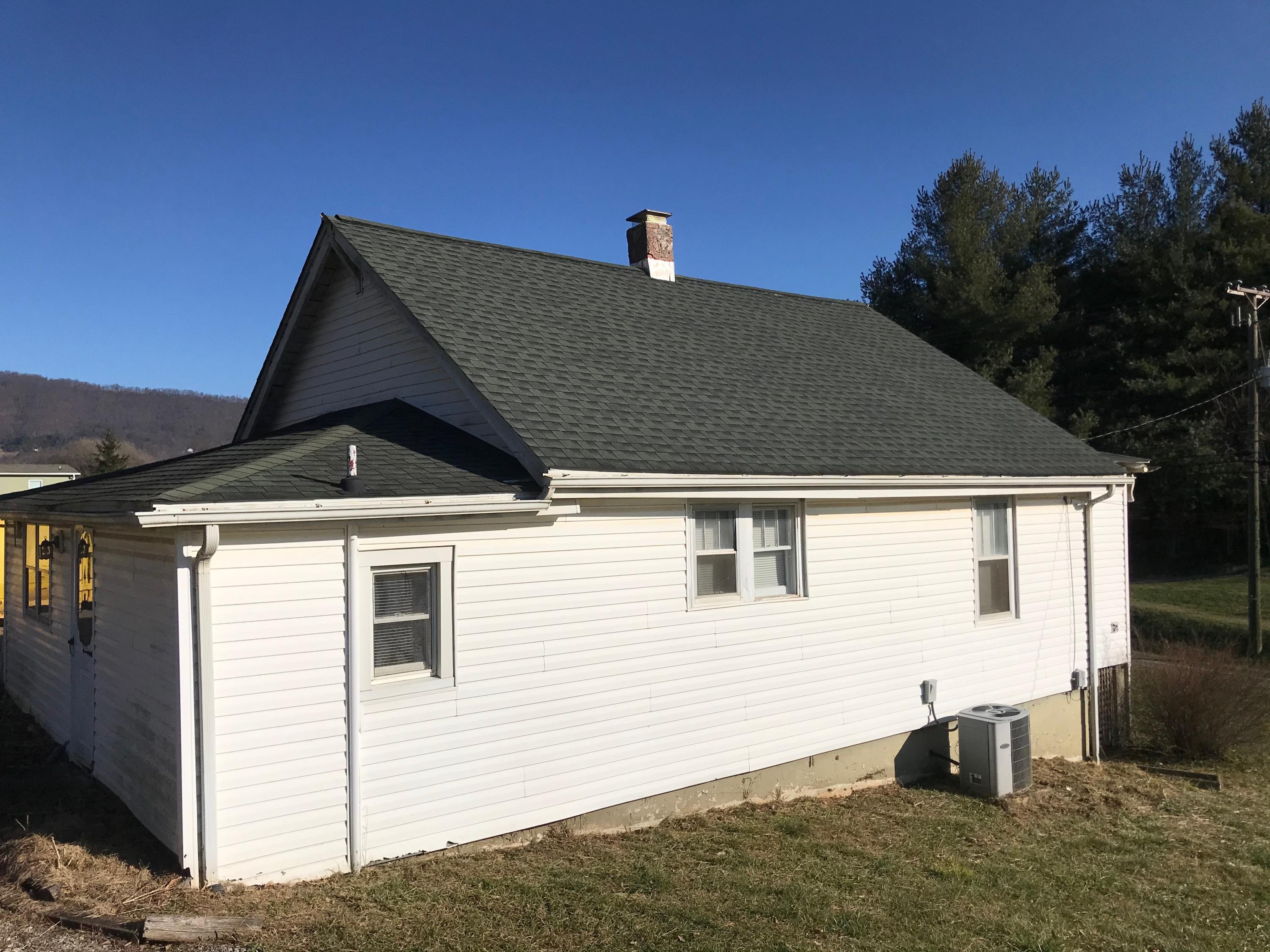 2553 Webster Road Roanoke, VA 24012 - Photo 25 of 29 a front view of a house with a garage