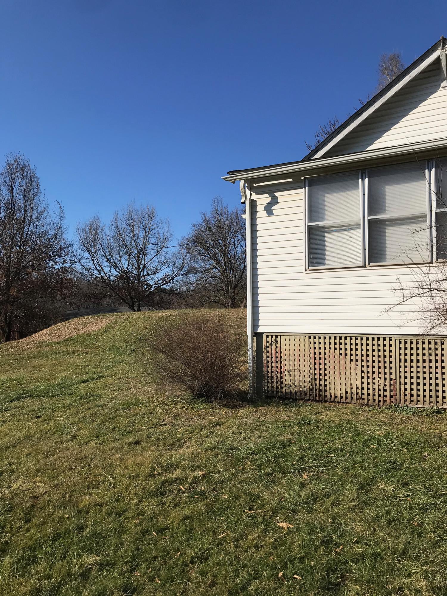 2553 Webster Road Roanoke, VA 24012 - Photo 27 of 29 a front view of a house with garden