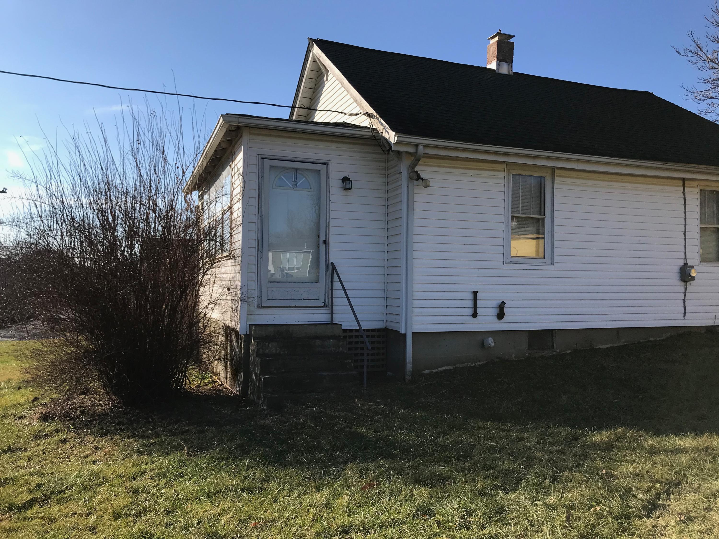 2553 Webster Road Roanoke, VA 24012 - Photo 29 of 29 a front view of a house with garden