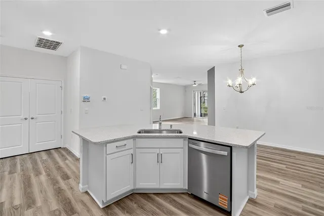 a view of a livingroom with wooden floor