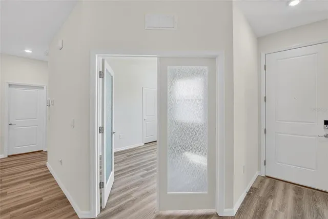 a bathroom with a tub a sink and a shower