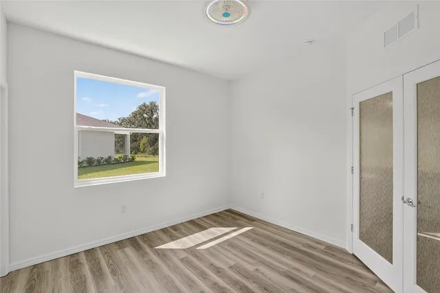 a view of storage and utility room with washer and dryer