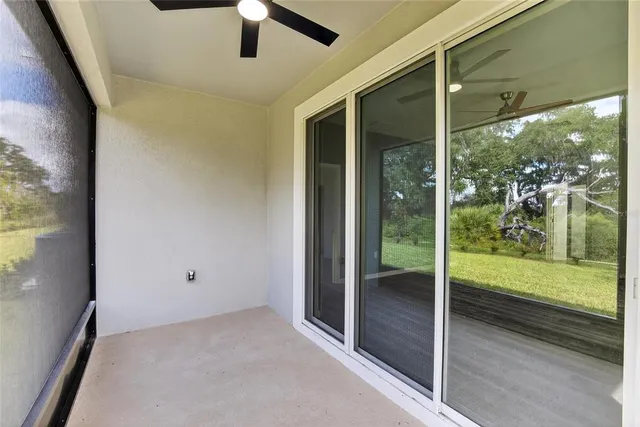 an aerial view of residential house with outdoor space and swimming pool