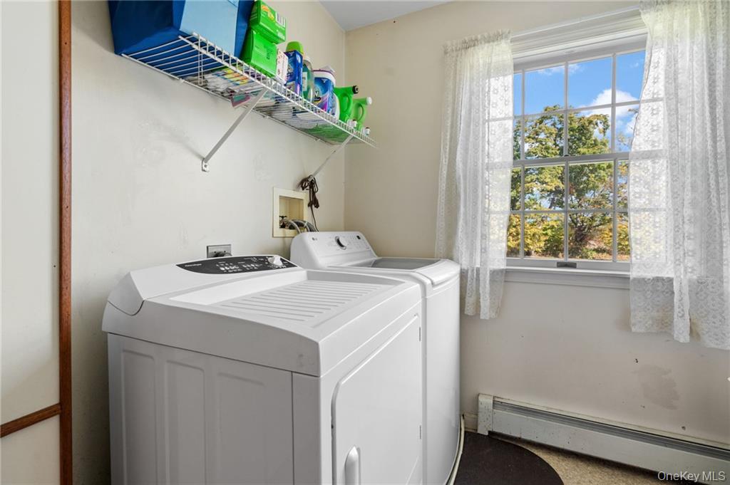 295 Borden Road Wallkill, NY 12589 - Photo 19 of 35 a utility room with dryer and washer