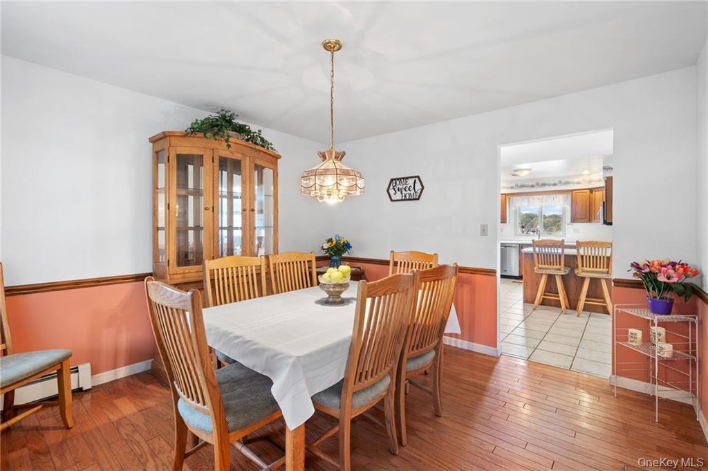 295 Borden Road Wallkill, NY 12589 - Photo 6 of 35 a view of a dining room with furniture window and wooden floor