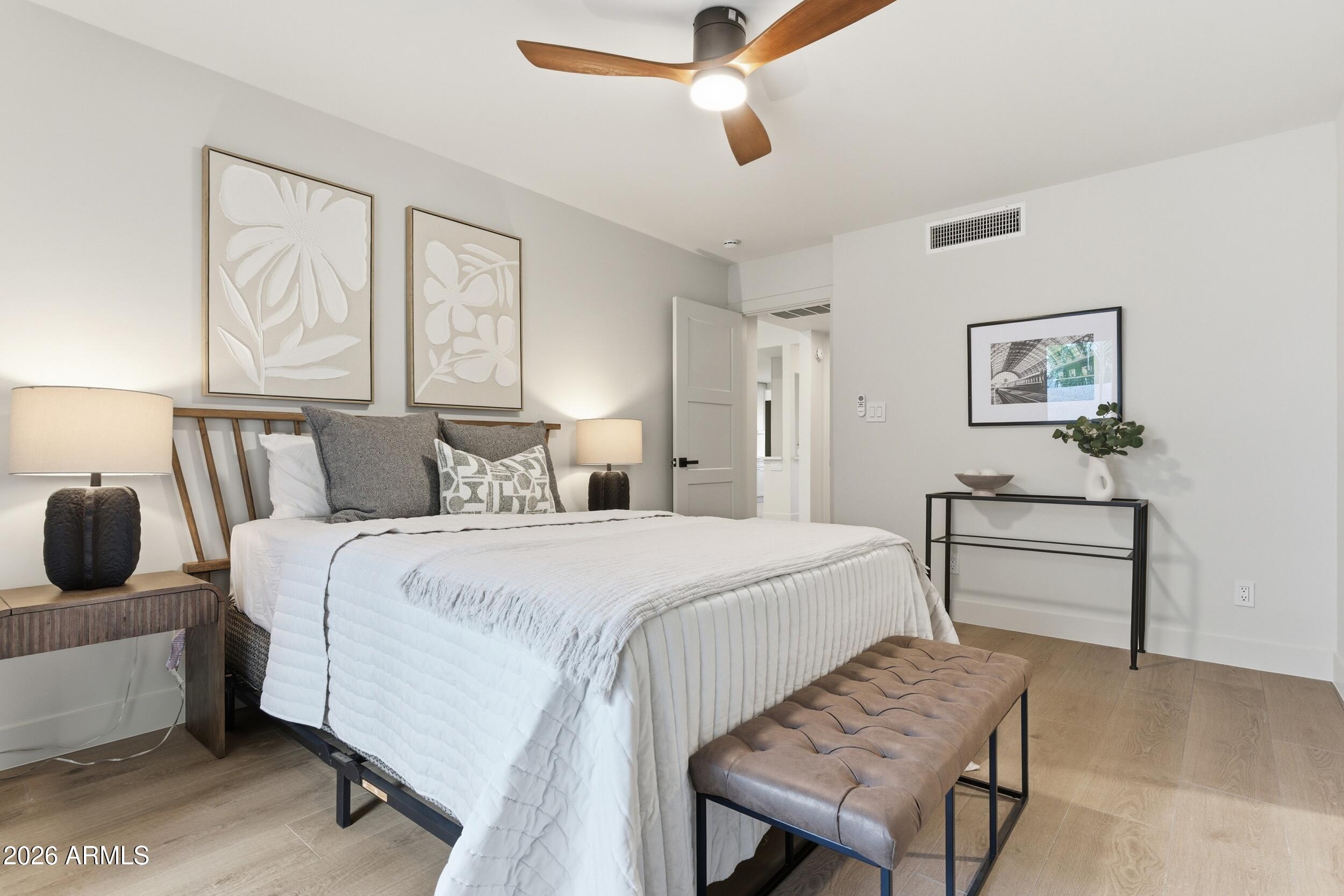 3415 North 36th Street, Unit 3 Phoenix, AZ 85018 - Photo 18 of 33 a bedroom with a bed and window