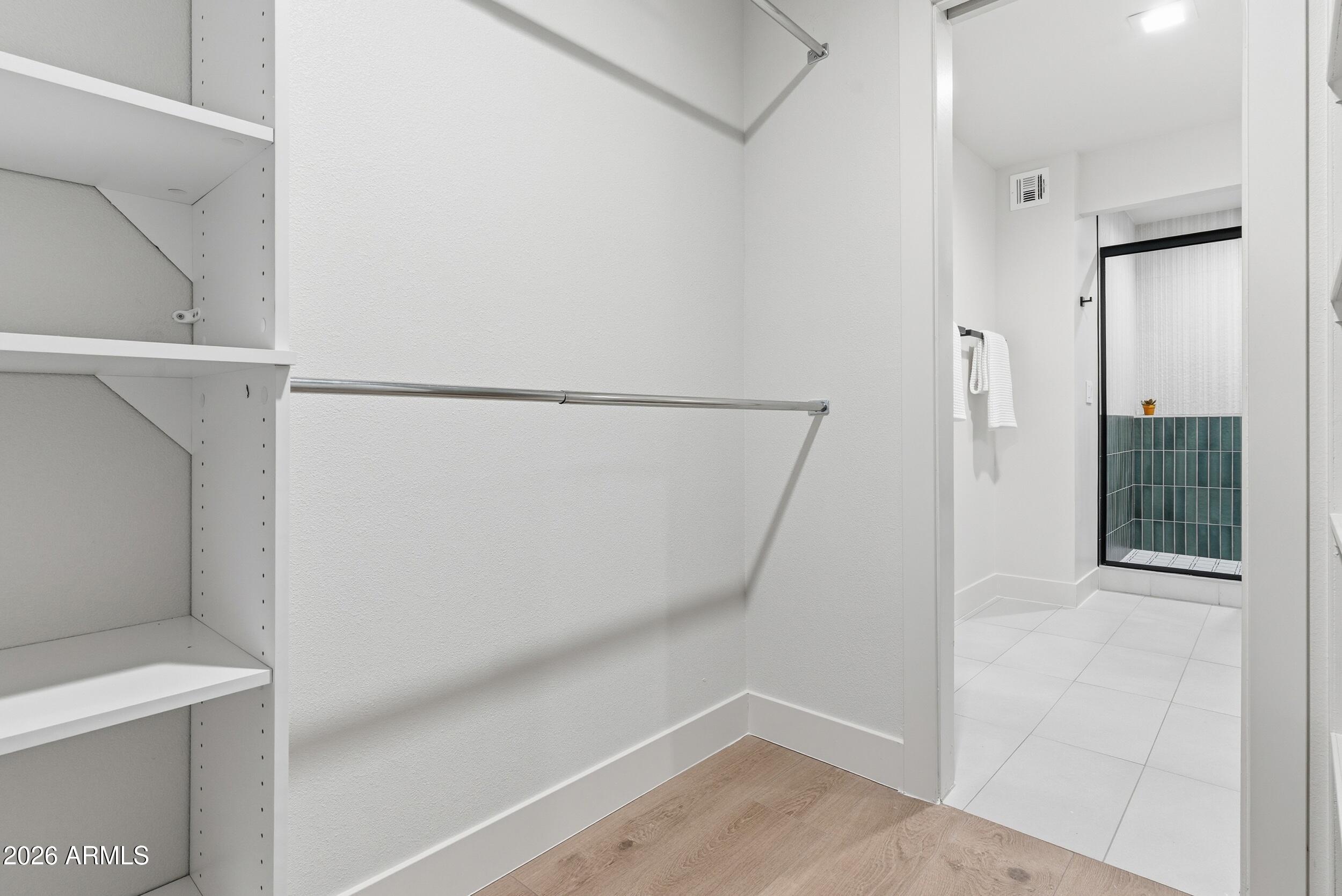 3415 North 36th Street, Unit 3 Phoenix, AZ 85018 - Photo 20 of 33 a view of walk in closet with empty racks