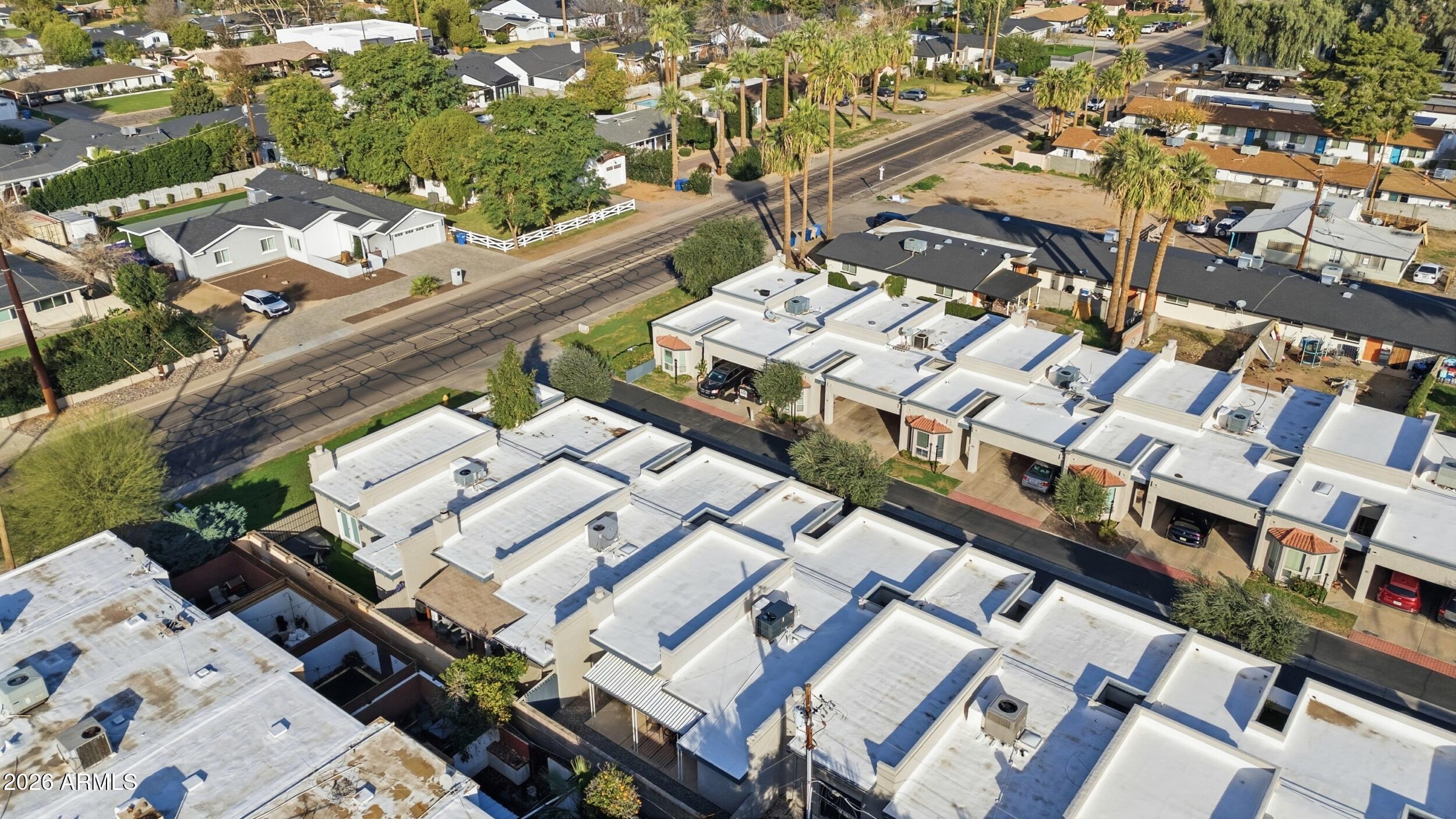 3415 North 36th Street, Unit 3 Phoenix, AZ 85018 - Photo 29 of 33 an aerial view of a building with a lot of residential buildings