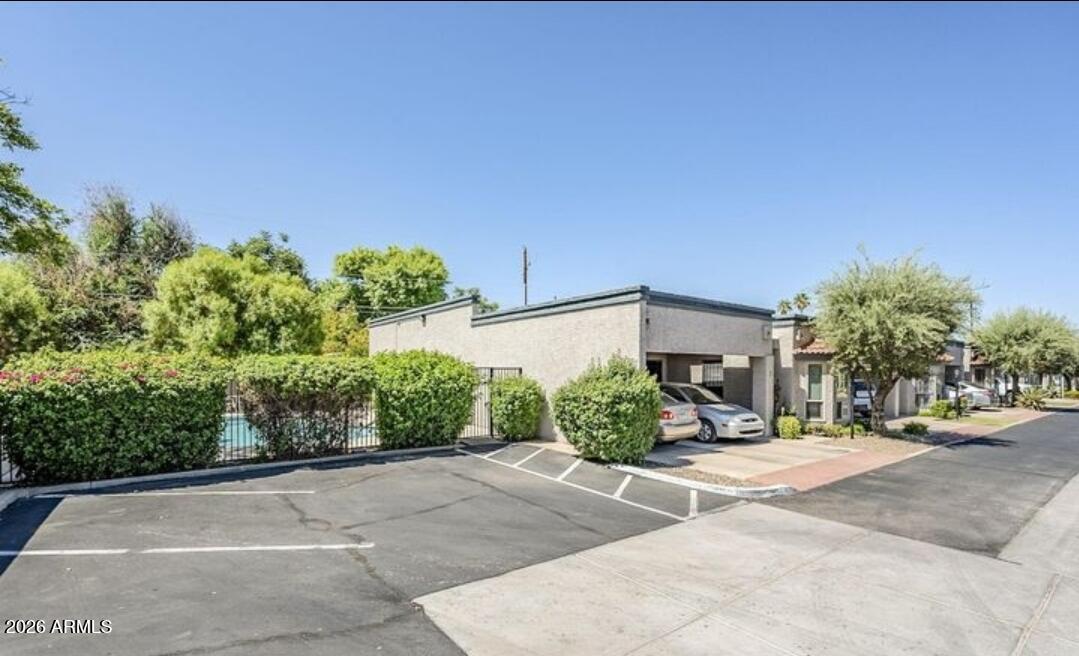 3415 North 36th Street, Unit 3 Phoenix, AZ 85018 - Photo 32 of 33 a view of a street with a house