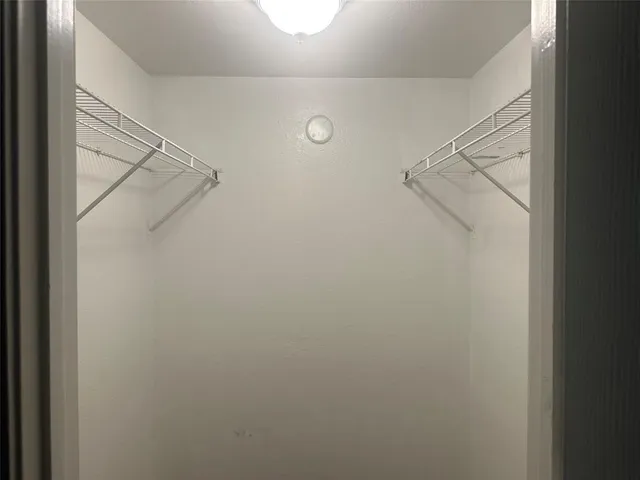 a view of a room with racks on the wall