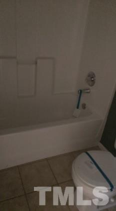 3909 Old Coach Road Raleigh, NC 27616 - Photo 9 of 10 a bathroom with a toilet