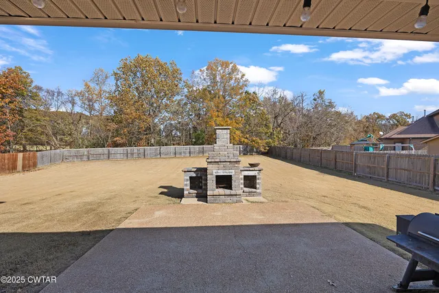 a terrace of a house with outdoor seating