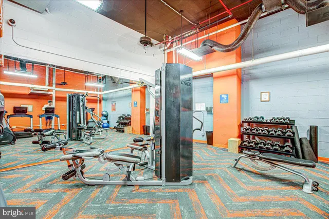 a room with lots of tables and chairs