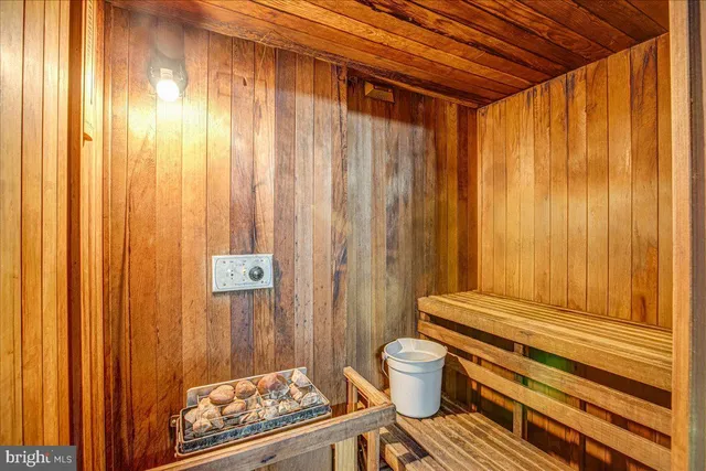a bathroom with a toilet and shower