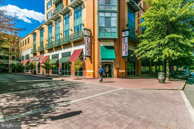 a view of a building with a street