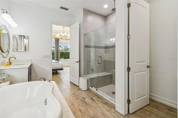 a bathroom with a bathtub and a sink