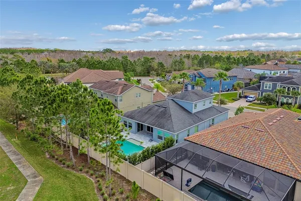 an aerial view of a house with a garden