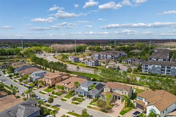 a view of a city with mountains in the background