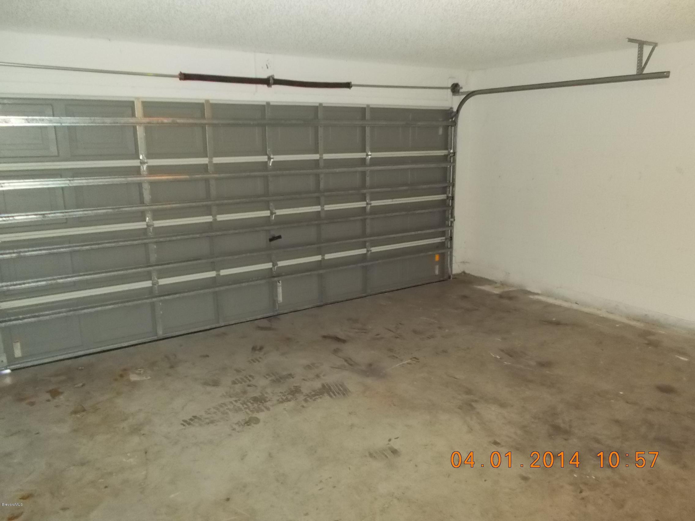 841 Degroodt Road Southwest Palm Bay, FL 32908 - Photo 17 of 19 Garage