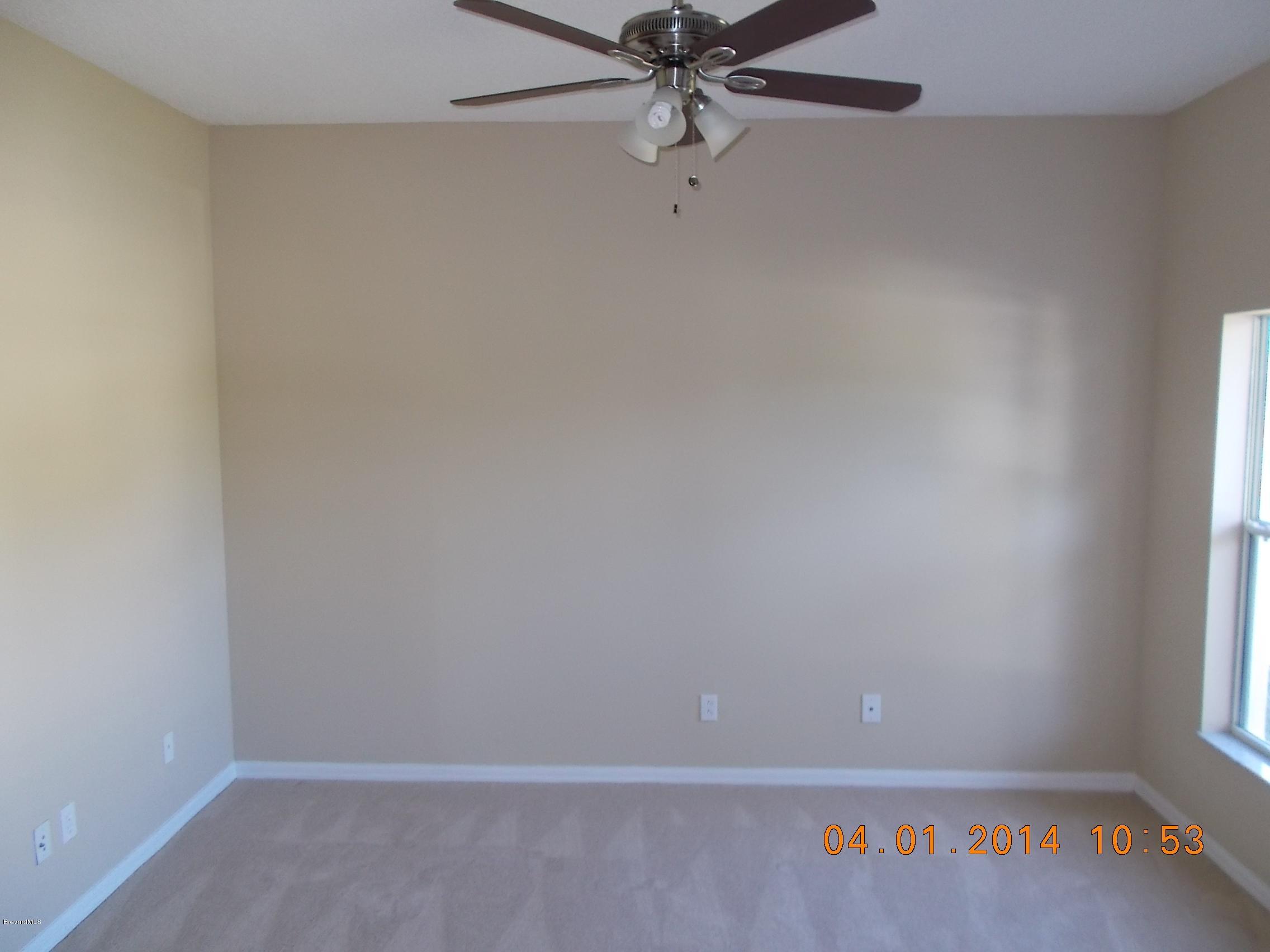 841 Degroodt Road Southwest Palm Bay, FL 32908 - Photo 6 of 19 Formal Living Room