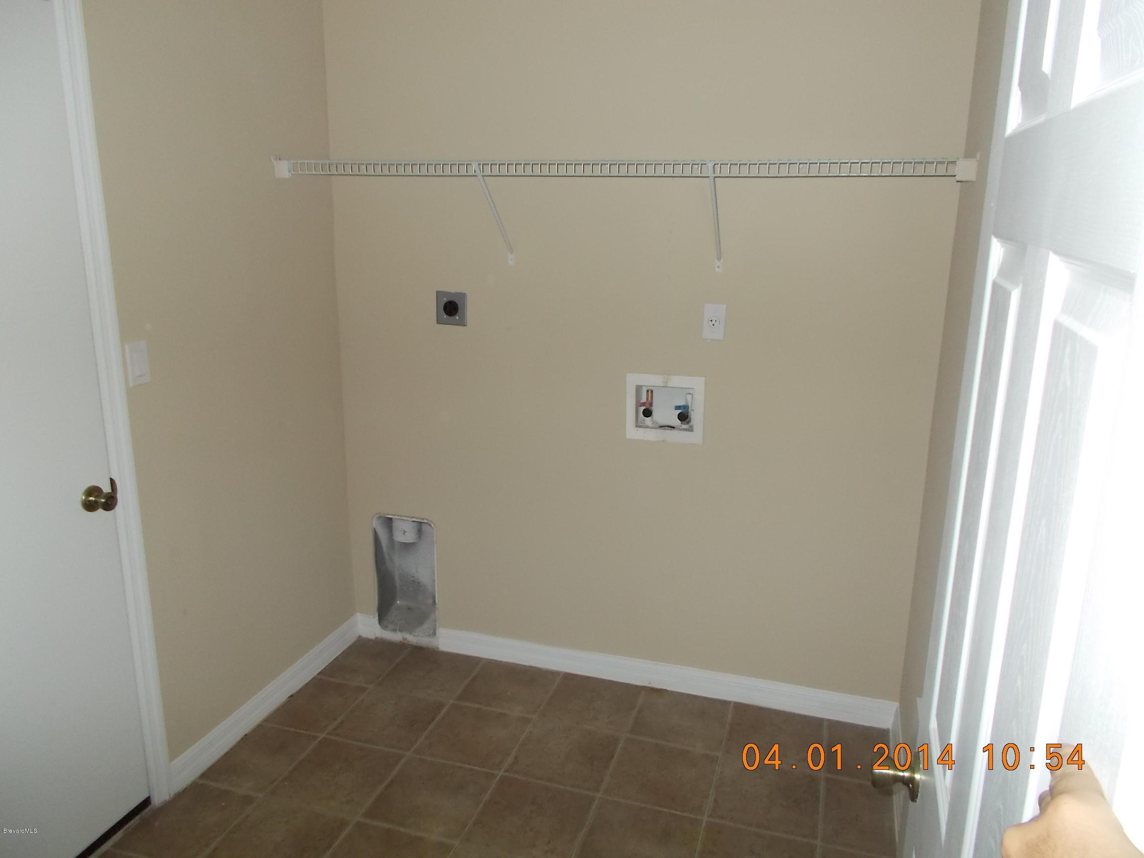 841 Degroodt Road Southwest Palm Bay, FL 32908 - Photo 9 of 19 Laundry Area