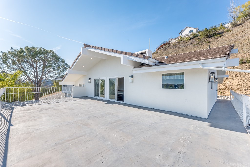 150 Saddlebow Road Bell Canyon, CA 91307 - Photo 13 of 37 a view of a house with a outdoor space