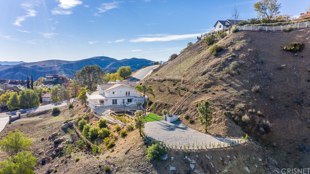150 Saddlebow Road Bell Canyon, CA 91307 - Photo 32 of 37 a view of a city with a mountain in the background