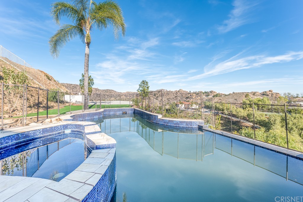 150 Saddlebow Road Bell Canyon, CA 91307 - Photo 35 of 37 a view of a balcony with city view