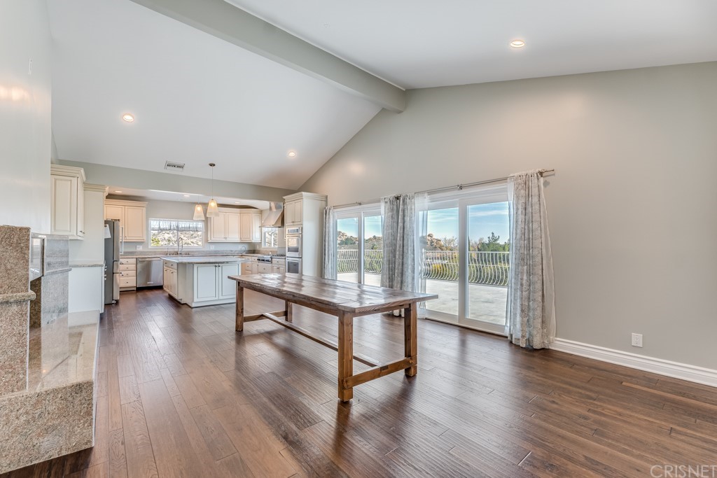 150 Saddlebow Road Bell Canyon, CA 91307 - Photo 5 of 37 a living room with furniture and a large window