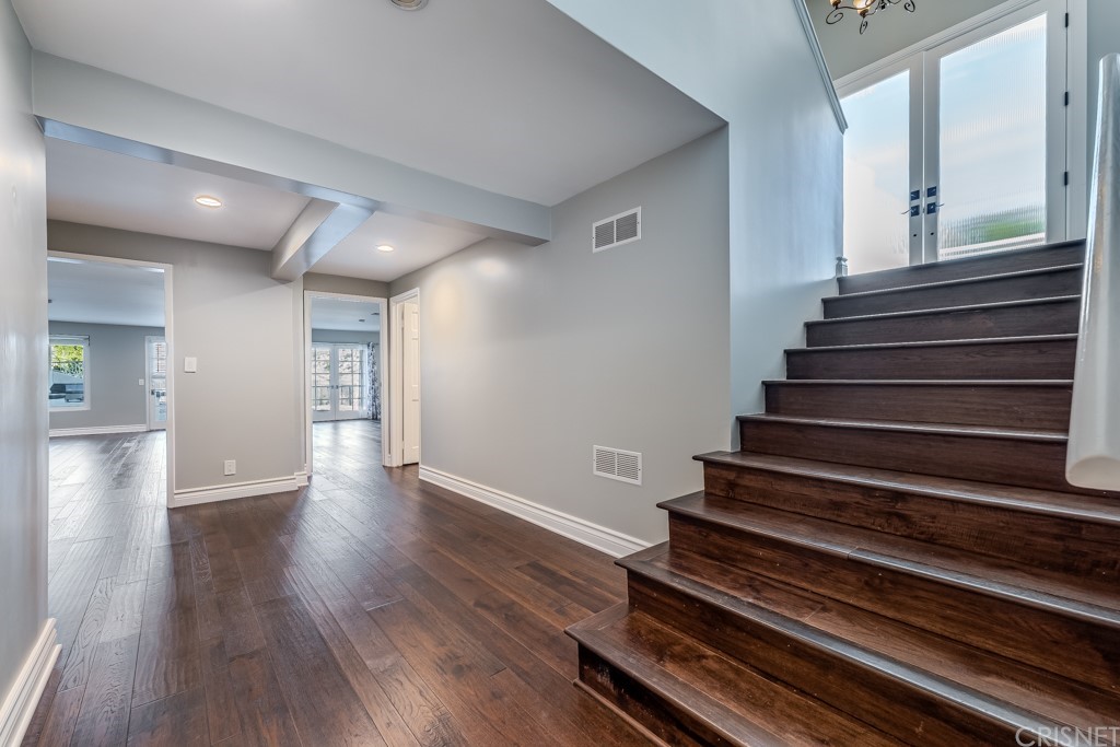 150 Saddlebow Road Bell Canyon, CA 91307 - Photo 10 of 37 a view of entryway and hall with wooden floor