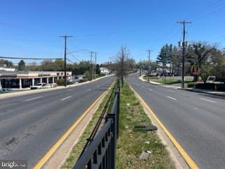 12130-est Veirs Mill Road Silver Spring, MD 20902 - Photo 8 of 12 a view of a swimming pool with a lake view