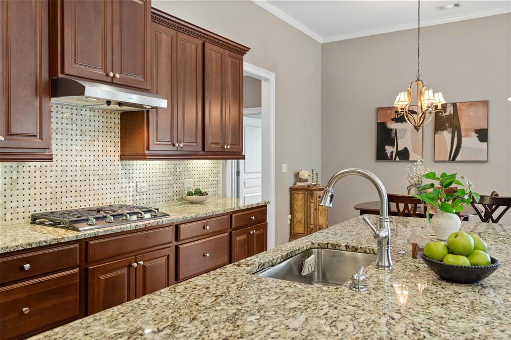 319 Laurel Lookout Hills Canton, GA 30114 - Photo 20 of 80 a kitchen with stainless steel appliances granite countertop a sink a stove and cabinets