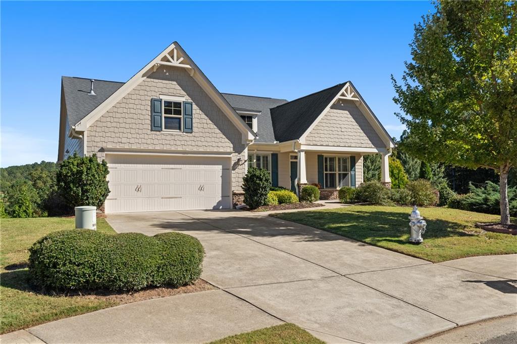 319 Laurel Lookout Hills Canton, GA 30114 - Photo 2 of 80 a front view of a house with a yard