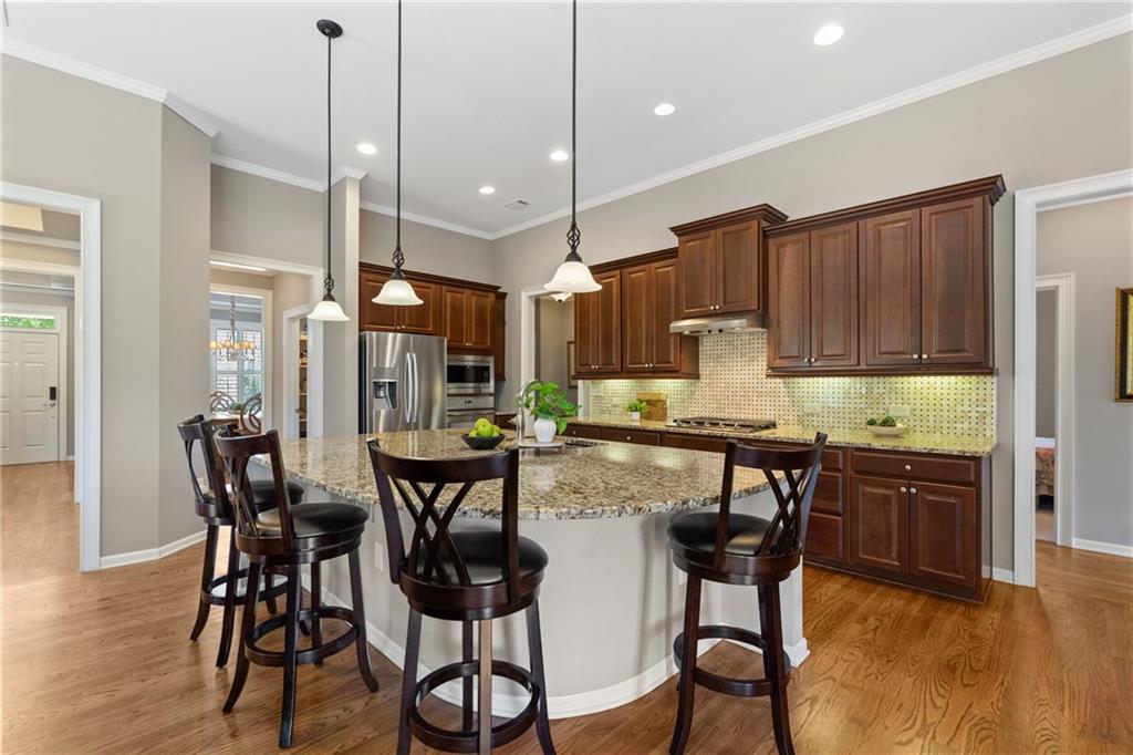 319 Laurel Lookout Hills Canton, GA 30114 - Photo 23 of 80 a view of a dining room with furniture window and wooden floor