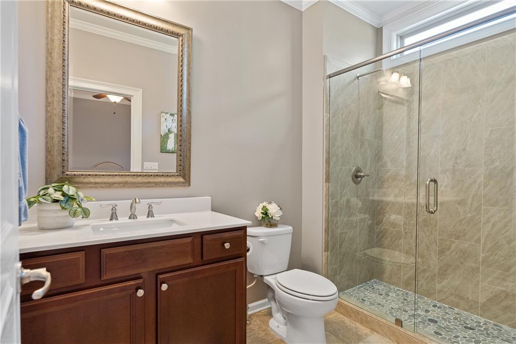 319 Laurel Lookout Hills Canton, GA 30114 - Photo 40 of 80 a bathroom with a sink toilet and shower