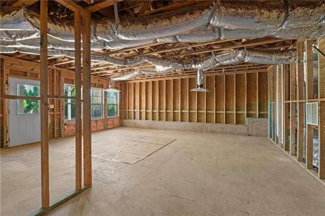 a view of a house with pool and a yard