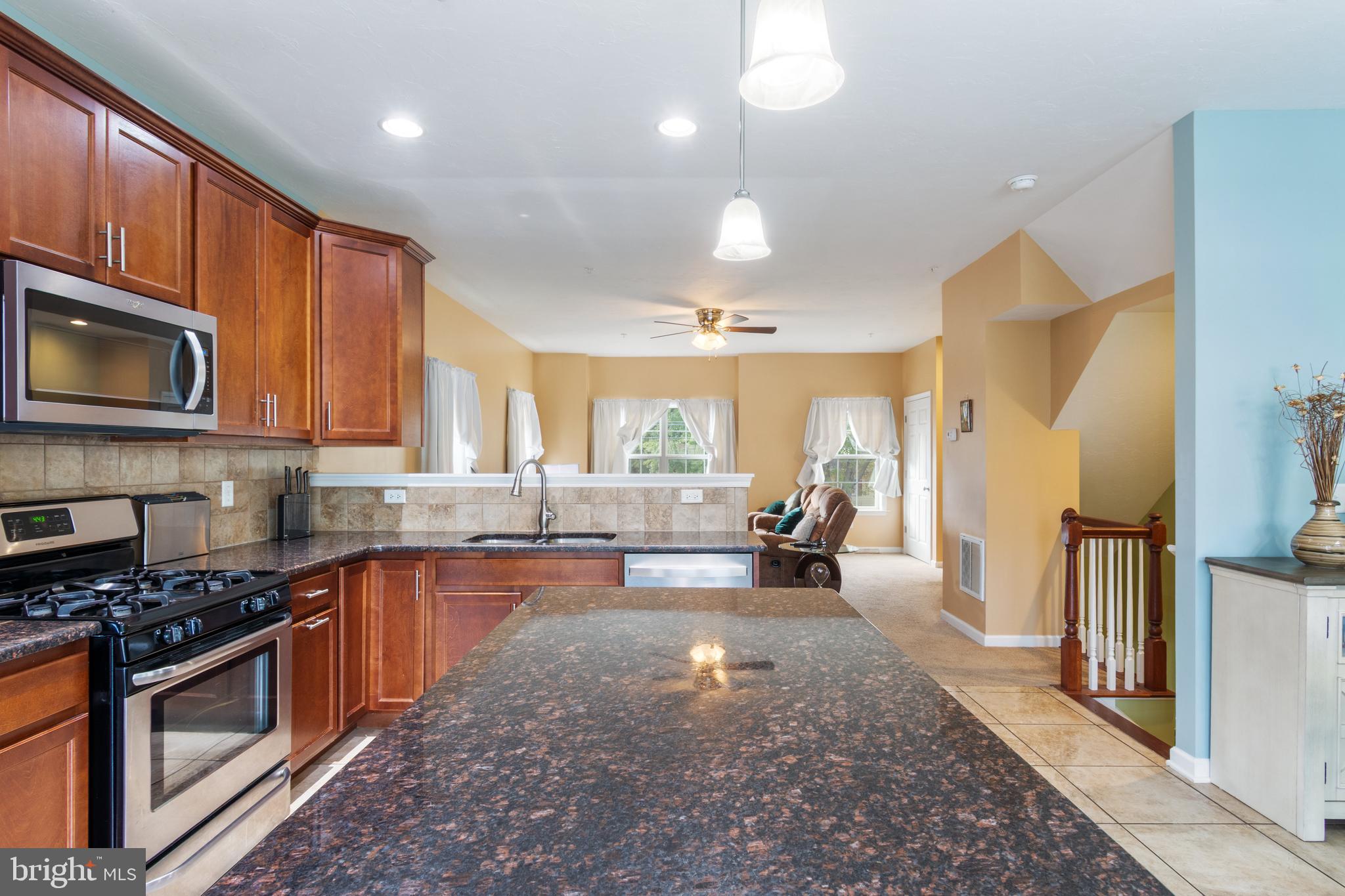 191 Moul Avenue Hanover, PA 17331 - Photo 18 of 49 a large kitchen with lots of counter space a sink and a stove top oven