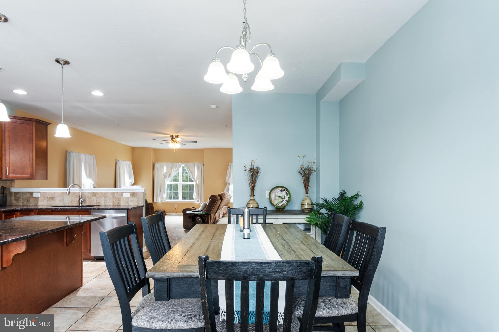 191 Moul Avenue Hanover, PA 17331 - Photo 20 of 49 a view of a a dining room with furniture window and wooden floor